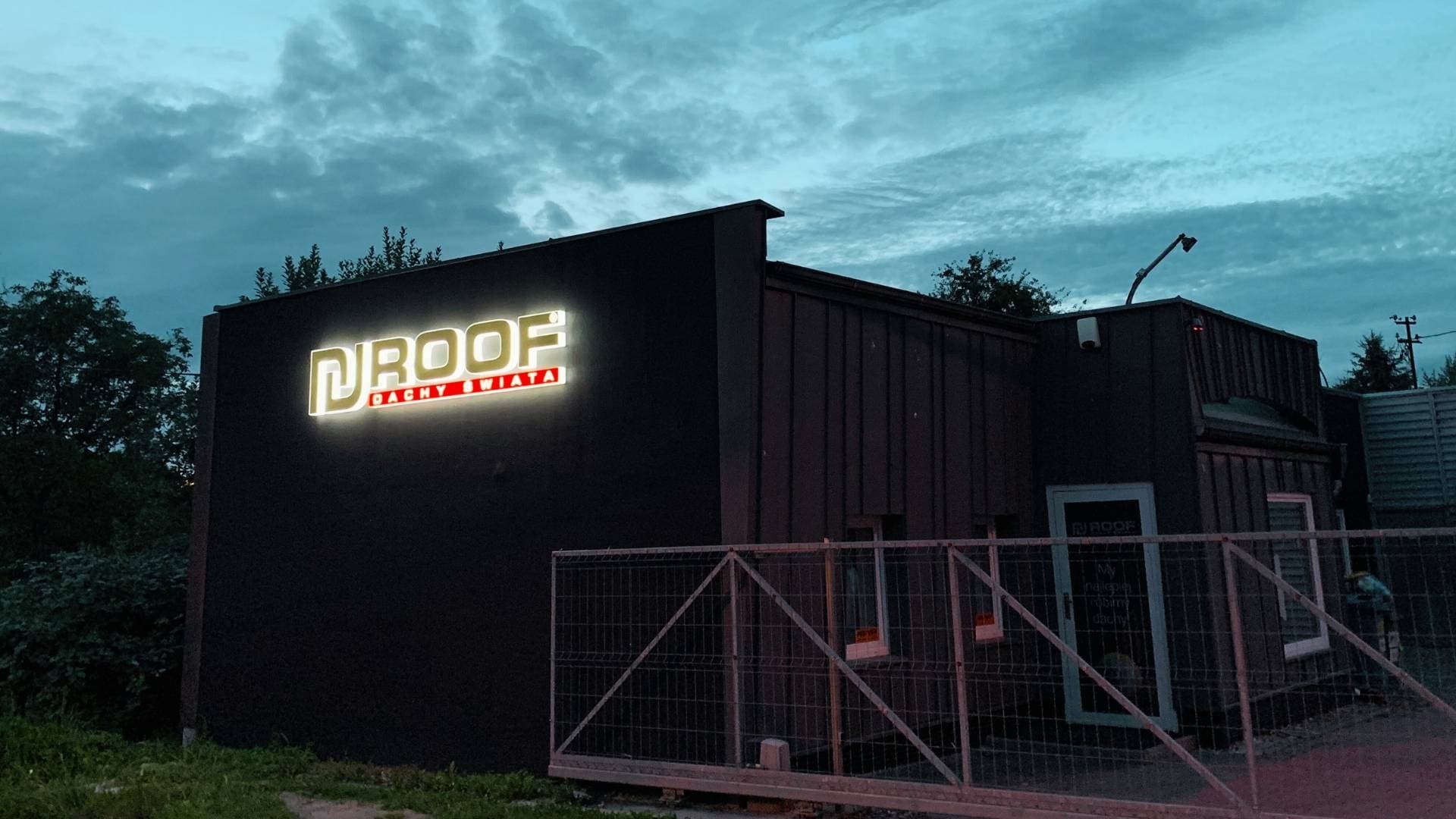 ROOF office building with illuminated logo